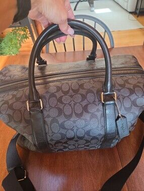 Coach Black Signature Leather Weekender tote bag dark gray and black.